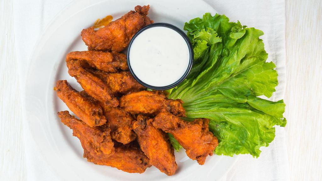 Buffalo Hot Wings · 6 wings with Celery & Carrots with Blue Cheese dip Sauce