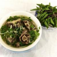 Pho Tai Bam & Duoi Bo · Beef Oxtail & Rare Minced Steak with Rice Noodle Soup