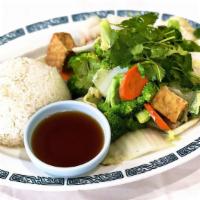 Com Rau Dau Hu · Stir Fry Vegetables & Tofu over Rice