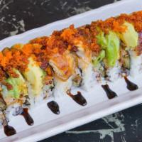 Dragon Roll (10 Pcs) · Shrimp tempura, imitation crab meat, top unagi. Avocado, sauce, tobiko.