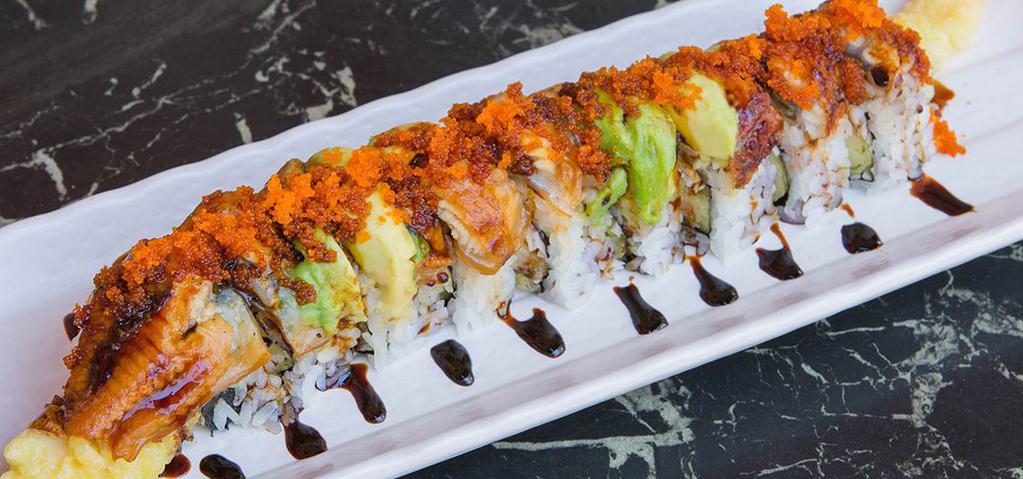 Dragon Roll (10 Pcs) · Shrimp tempura, imitation crab meat, top unagi. Avocado, sauce, tobiko.