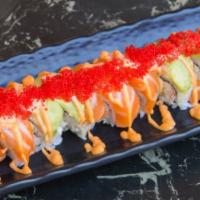 Pink Dragon Roll (10 Pcs) · Shrimp tempura, imitation crab meat, top salmon, avocado, sauce, tobiko.