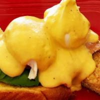 Eggs Hemingway with Avocado · Two poached eggs on smoked salmon and avocado with our fresh hollandaise and home fries.  Se...