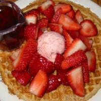 Strawberry Waffle · Our buttermilk or gluten-free cornmeal waffle topped with fresh strawberries and our homemad...