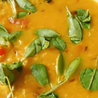 Dal Tadka (Vegan)  · Traditional yellow lentil cooked with fresh tomatoes and garlic.