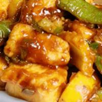 Chilli Tofu (Vegan) · Delicious Tofu tossed with bell peppers, onions and  tomatoes with touch of fresh cilantro.