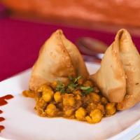 Samosa Chaat · Extremely flavorful most popular street snack foods in India triangular crispy potato patty ...