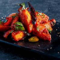 Chilli Fried Idly · Crispy rice cakes tossed with spicy chilli sauce.
