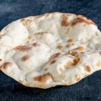 Naan · Indian flat bread made with wheat and cooked in a tandoor.