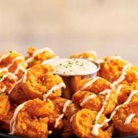 Bloomin' Fried Shrimp · All the spices and flavor that make our Bloomin’ Onion on tender, bite-sized shrimp. Hand br...