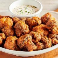 Sydney Shrooms · Lightly battered and fried mushrooms served with house-made ranch dressing.