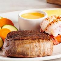 Victoria'S Filet® Mignon* & Lobster · A tender and juicy thick-cut filet paired with a steamed lobster tail. Served with a choice ...