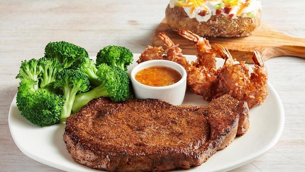 12Oz Ribeye* & Choice Of Shrimp · Our 12 oz. hand-cut ribeye with Grilled Shrimp on the Barbie or Coconut Shrimp. Served with two freshly made sides.