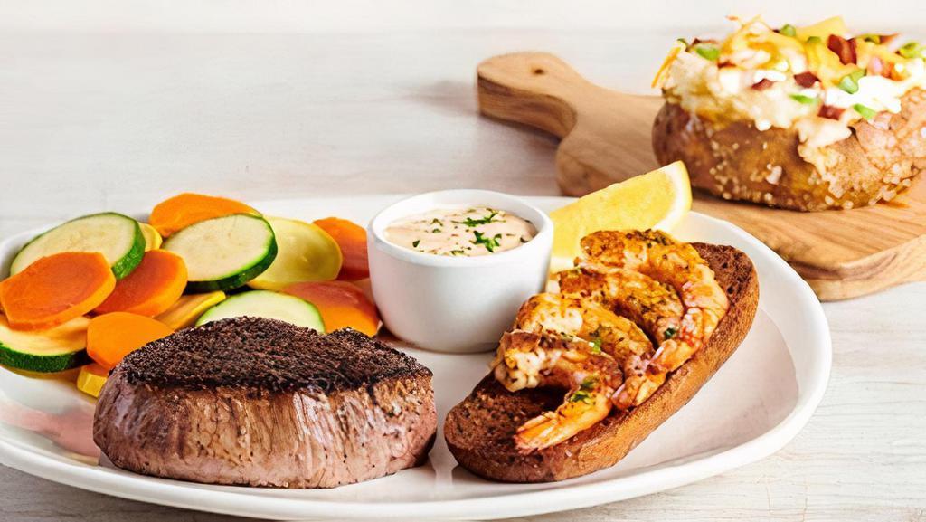 Sirloin* & Shrimp On The Barbie · Our signature center-cut sirloin with Grilled Shrimp on the Barbie. Served with two freshly made sides.