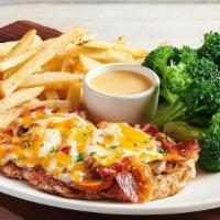 Alice Springs Chicken® · Grilled chicken breast topped with sautéed mushrooms, crisp bacon, melted Monterey Jack and ...
