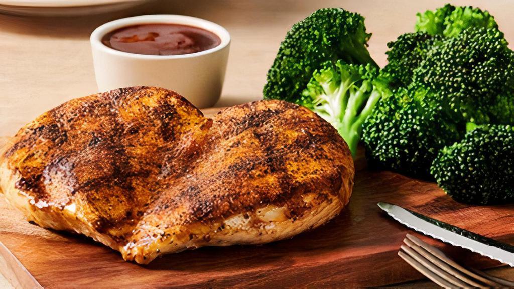 Grilled Chicken On The Barbie · Seasoned and wood-fire grilled chicken breast with our signature BBQ sauce. Served with your choice of two freshly made sides.