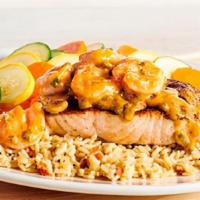 Toowoomba Salmon · Grilled Salmon topped with seasoned and sautéed shrimp tossed with mushrooms in a creamy cre...