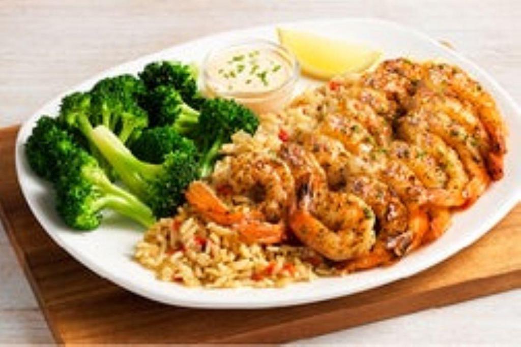 Grilled Shrimp On The Barbie · Seasoned and grilled. Served with our classic rémoulade sauce. Served with two freshly made sides.