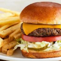 The Outbacker Burger* · Topped with lettuce, tomato, onion, house-made pickles and mustard. Served with one freshly ...