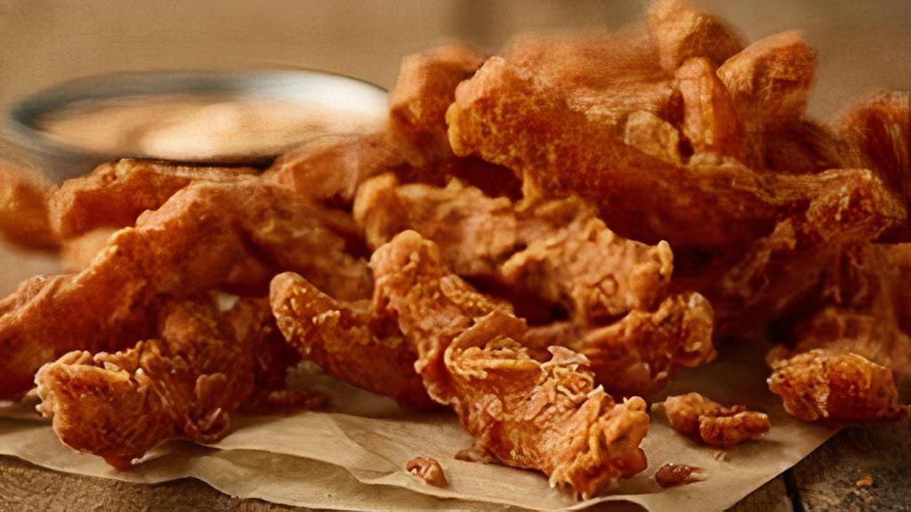 Bloom Petals · Bloomin' Onion® petals served with our signature bloom sauce.