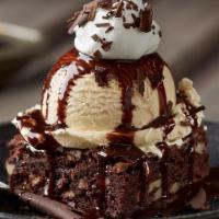 Chocolate Thunder From Down Under®** · An extra-generous pecan brownie topped with rich vanilla ice cream, our warm chocolate sauce...