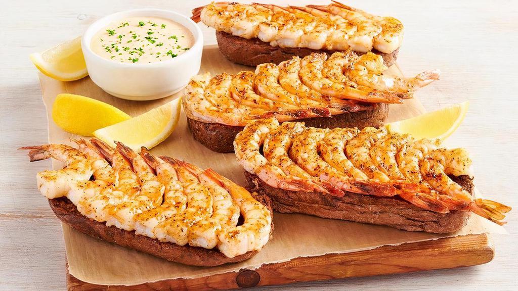 Grilled Shrimp On The Barbie Party Platter · 32 shrimp skewered, seasoned with a special blend of herbs and spices then flame grilled. Served with Outback’s own garlic toast and classic rémoulade sauce. Serves 4 - 6.