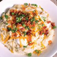 Loaded Mashed Platter  · Topped with sour cream, bacon, green onions, Monterey Jack and Cheddar cheese. Serves 4 - 6.