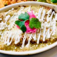 Enchiladas Verdes o Rojas · Choice of chicken or cheese enchiladas, smothered in either our red or green salsas. Topped ...