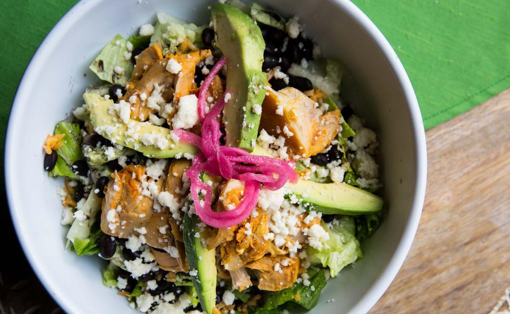 Burrito Bowl · Get all the fixings minus the guilt! Organic romaine lettuce, rice, black beans, your choice of protein, pico de gallo, crema, queso fresco, and avocado slices.