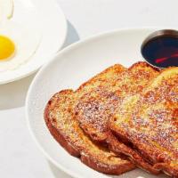 French Toast Combo · Two slices of thick, egg-washed cinnamon bread served with maple syrup and powdered sugar, p...
