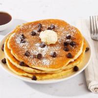 Chocolate Chip Pancakes · Two fluffy buttermilk pancakes topped with rich chocolate chips, and served with maple syrup...