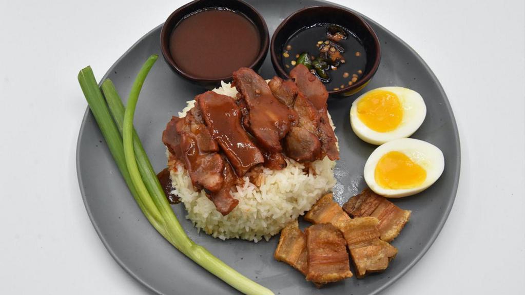 Khao Moo Daeng · roasted pork over rice with crispy pork belly & boiled egg, drizzled with sweet red gravy
