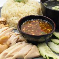 Khao Munn Gai · poached chicken over garlic & ginger rice, cucumber, chicken soup & home made sauce