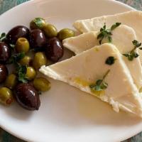 Feta & Olives · Marinated Greek olives and feta cheese top with olive oil & oregano.
