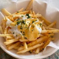 Greek fries · French fries with mild spicy garlic yogurt fondue.