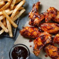8 Grilled Wings · 8 Seasoned Grilled Wings served with seasoned fries and your choice of Ranch or Blue Cheese.