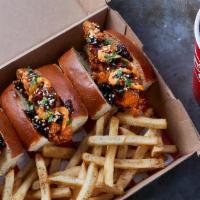 Whiskey-Glazed Bird Dog Combo · 3 Chicken fingers tossed in Whiskey-Glaze on mini buns with spicy aioli and sesame seasoning...