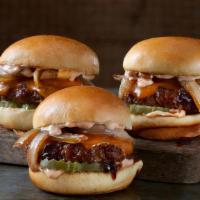 Whiskey-Glazed Sliders · 3 juicy burgers topped with Signature Whiskey-Glaze, cheddar, onions, pickles and a spicy ma...