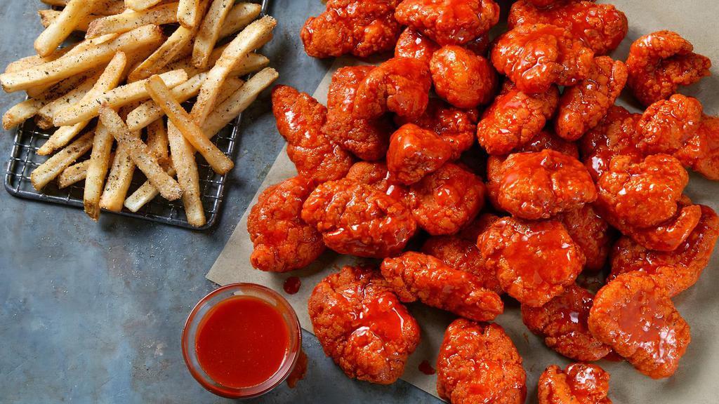 Small Family Size Boneless Wings · 24 Boneless Wings tossed in your choice of sauces and served with Ranch or Blue Cheese.