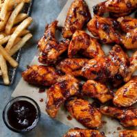 Small Family Size Grilled Wings · 24 Seasoned Grilled Wings served with Ranch or Blue Cheese.