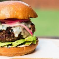 The Beef Avocado Ranch Burger · Hand made ground beef patty, avocado, creamy cheese, lettuce, tomatoes, onions, pickles, may...
