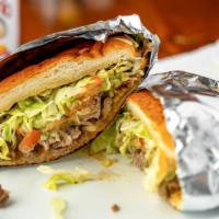 Tortas · Mexican style sandwich, choice of meat, cheese, sour crema, guacamole, salsa, lettuce and to...