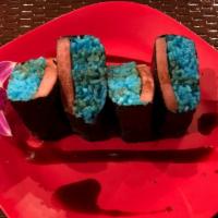 Spam Musubi (2) · our polu rice, topped with a slice of spam marinated in our ohana sauce, then wrapped in nor...