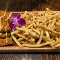 Fish & Fries · deep fried mahi mahi and crispy, thin cut french fries. served with our house chipotle sauce.