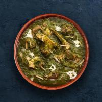 Lamb Saag · Tender lamb morsels slowly cooked in a rich spinach sauce.