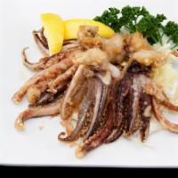 Geso Karaage · Seasoned deep fried calamari legs.