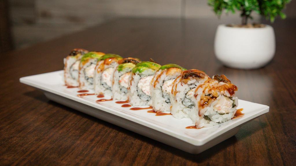 Dragon Roll · Eel cucumber inside topped with fresh avocado, eel sauce and tobiko.