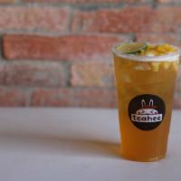 HIGH BY THE PEACH · Organic Jasmine Green Tea infused with Peach, topped with Peach slices, and lemon slice.