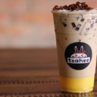 CLASSIC MILK TEA · Organic Black Milk Tea topped with Egg Pudding and Coffee Jelly