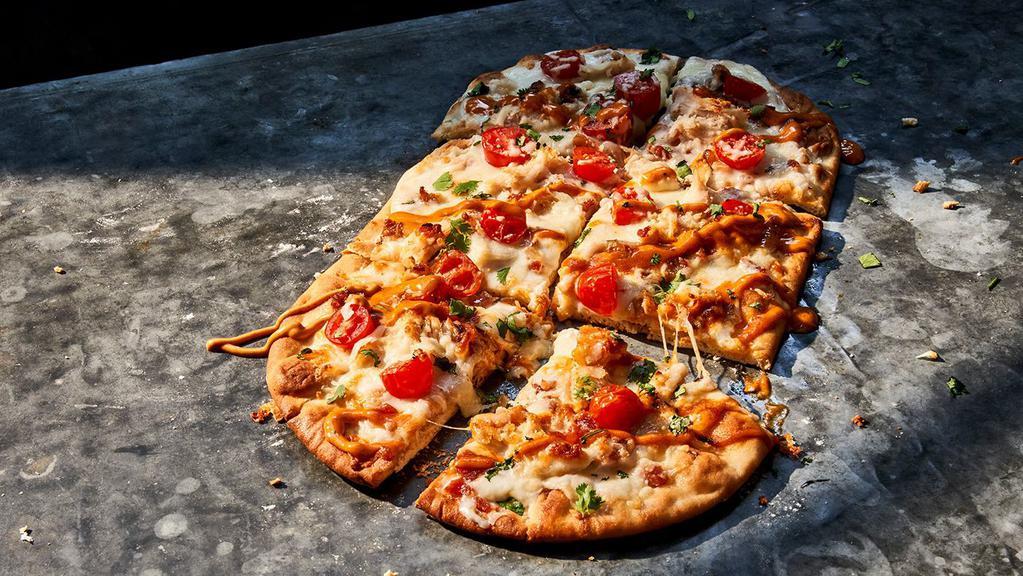 Chipotle Chicken & Bacon Flatbread Pizza · 980 Cal. Smoked, pulled chicken raised without antibiotics, chopped Applewood-smoked bacon, grape tomatoes and our fontina and mozzarella blend with garlic cream sauce on our flatbread. Allergens: Contains Wheat, Milk, Egg